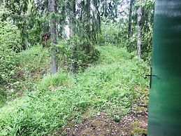 Tiny hut in the Forest Overlooking the River