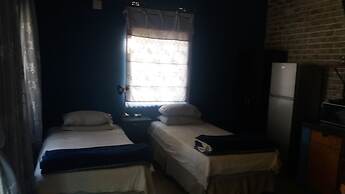 Room-comfy Room With Dstv and Aircon in