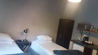 Room-comfy Room With Dstv and Aircon in