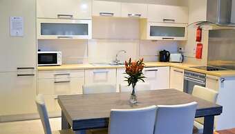 Carrick Plaza Suites & Apartments