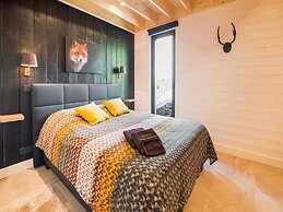 Idyllic Chalet in Biron with 2 Hot Tubs & Sauna