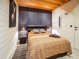 Idyllic Chalet in Biron with 2 Hot Tubs & Sauna