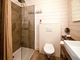 Idyllic Chalet in Biron with 2 Hot Tubs & Sauna