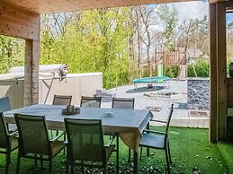 Idyllic Chalet in Biron with 2 Hot Tubs & Sauna