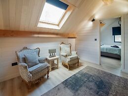Idyllic Chalet in Biron with 2 Hot Tubs & Sauna