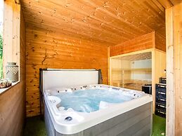 Idyllic Chalet in Biron with 2 Hot Tubs & Sauna