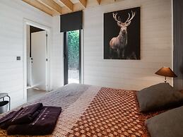 Idyllic Chalet in Biron with 2 Hot Tubs & Sauna