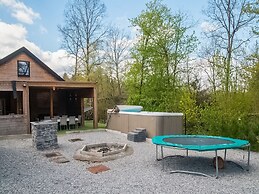 Idyllic Chalet in Biron with 2 Hot Tubs & Sauna