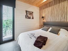 Idyllic Chalet in Biron with 2 Hot Tubs & Sauna