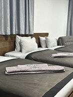 Grey Escape Apartements