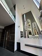 Grey Escape Apartements