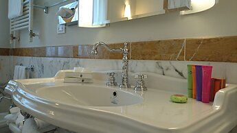 Villa Tolomei Hotel & Resort