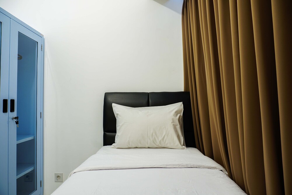 Minimalist and Warm 2BR M-Town Apartment