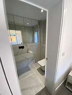 Stylish 2 Bed 2 Bath Flat with Garden