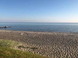 Seaside Serenity at Hasmark Beach-by Traum