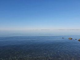 Seaside Serenity at Hasmark Beach-by Traum