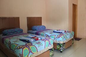 Penginapan Transit Tomato