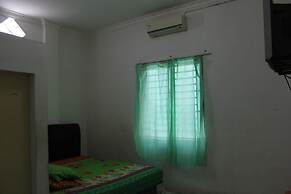 Penginapan Transit Tomato