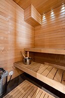 1BR Penthouse with Sauna & Private Rooftop Terrace
