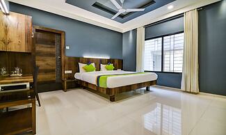 Treebo Shree Sai Suites - 2km from Mahalaxmi Temple