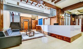 Treebo Shree Sai Suites - 2km from Mahalaxmi Temple