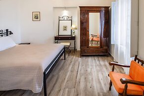 Day One Fira Mansion