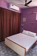 Parisha Residency - Temple Side Hotel