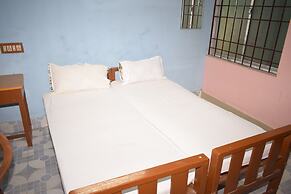 Parisha Residency - Temple Side Hotel