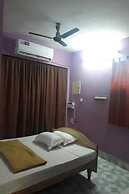 Parisha Residency - Temple Side Hotel