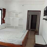 Parisha Residency - Temple Side Hotel
