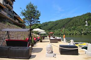 Retro Riverside Wellness Resort