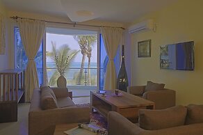 Cowrie Shell Beach Apartments