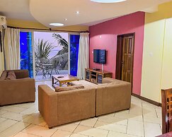 Cowrie Shell Beach Apartments