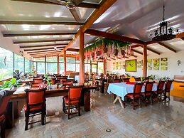Heliconias Lodge and Rainforest