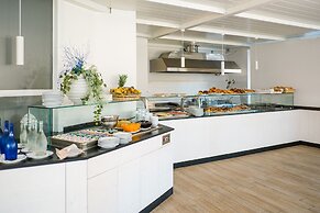 Ticho's Greenblu Hotel