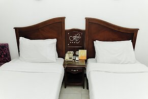 Happy City Hotel