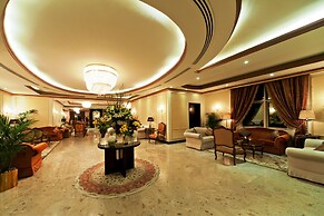 Magnum Hotel & Suites West Bay