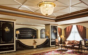 Magnum Hotel & Suites West Bay
