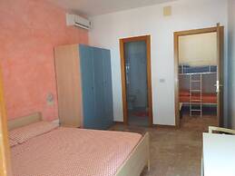Room-quadruple Room for a Totally Relaxi