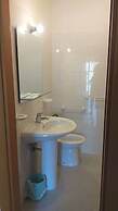 Room-quadruple Room for a Totally Relaxi