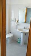 Room-quadruple Room for a Totally Relaxi