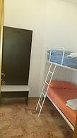 Room-quadruple Room for a Totally Relaxi