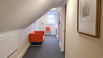 Grace Apartments - Living Rock