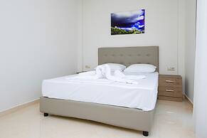 Amara Suites and Studios