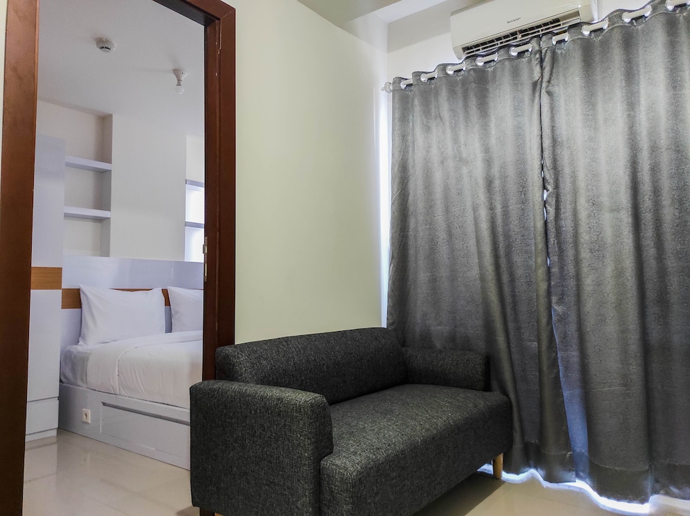 Homey and Comfy 2BR at Vida View Apartment