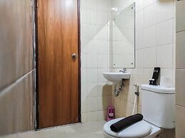 Homey and Comfy 2BR at Vida View Apartment