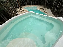 Aldea Maya-Ha Cabañas con cenotes