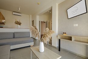 Theos village apartments