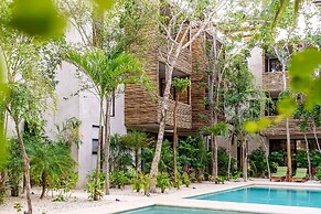 Eco-sustainable Luxury Between Beach Hotspots & Tulum Town by Stella R