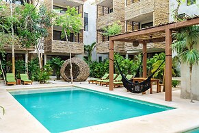 Eco-sustainable Luxury Between Beach Hotspots & Tulum Town by Stella R